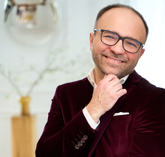 Logo Goździkowski na białym tle z nowoczesną czcionką